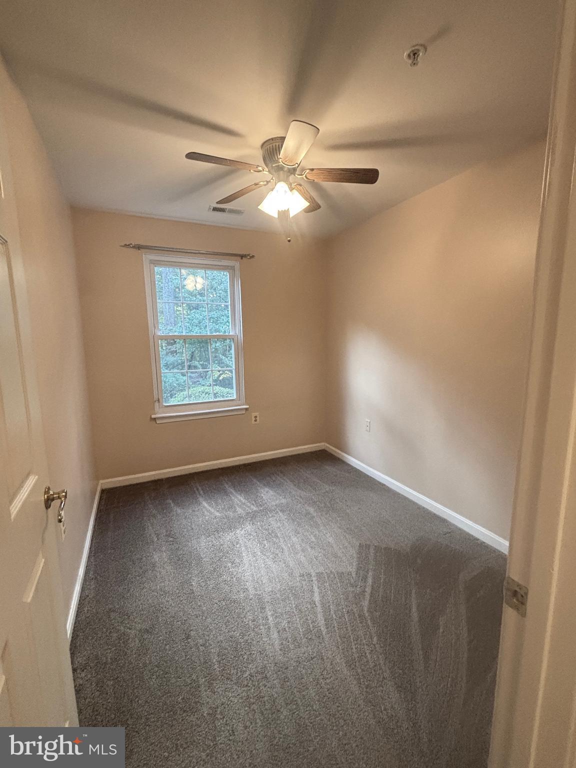 307 Tall Pines Court, Unit 3 Abingdon, MD 21009 - Photo 36 of 52 an empty room with windows and fan
