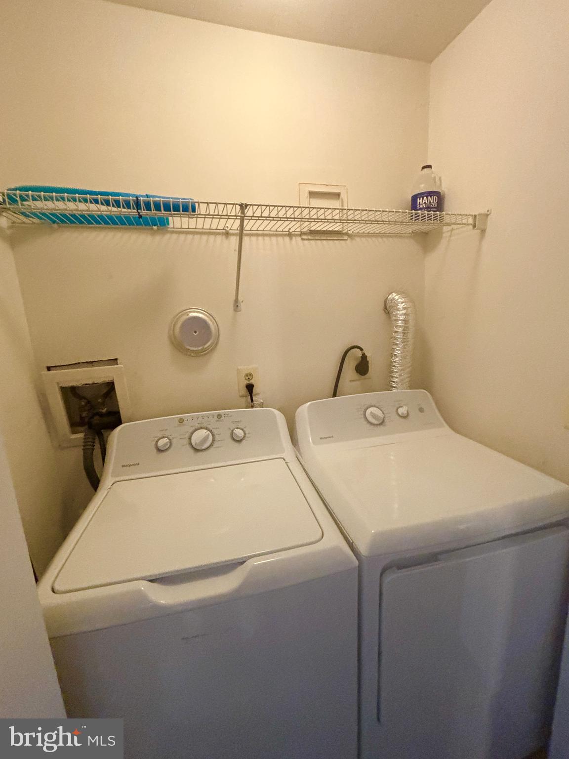 307 Tall Pines Court, Unit 3 Abingdon, MD 21009 - Photo 45 of 52 a utility room with dryer and washer