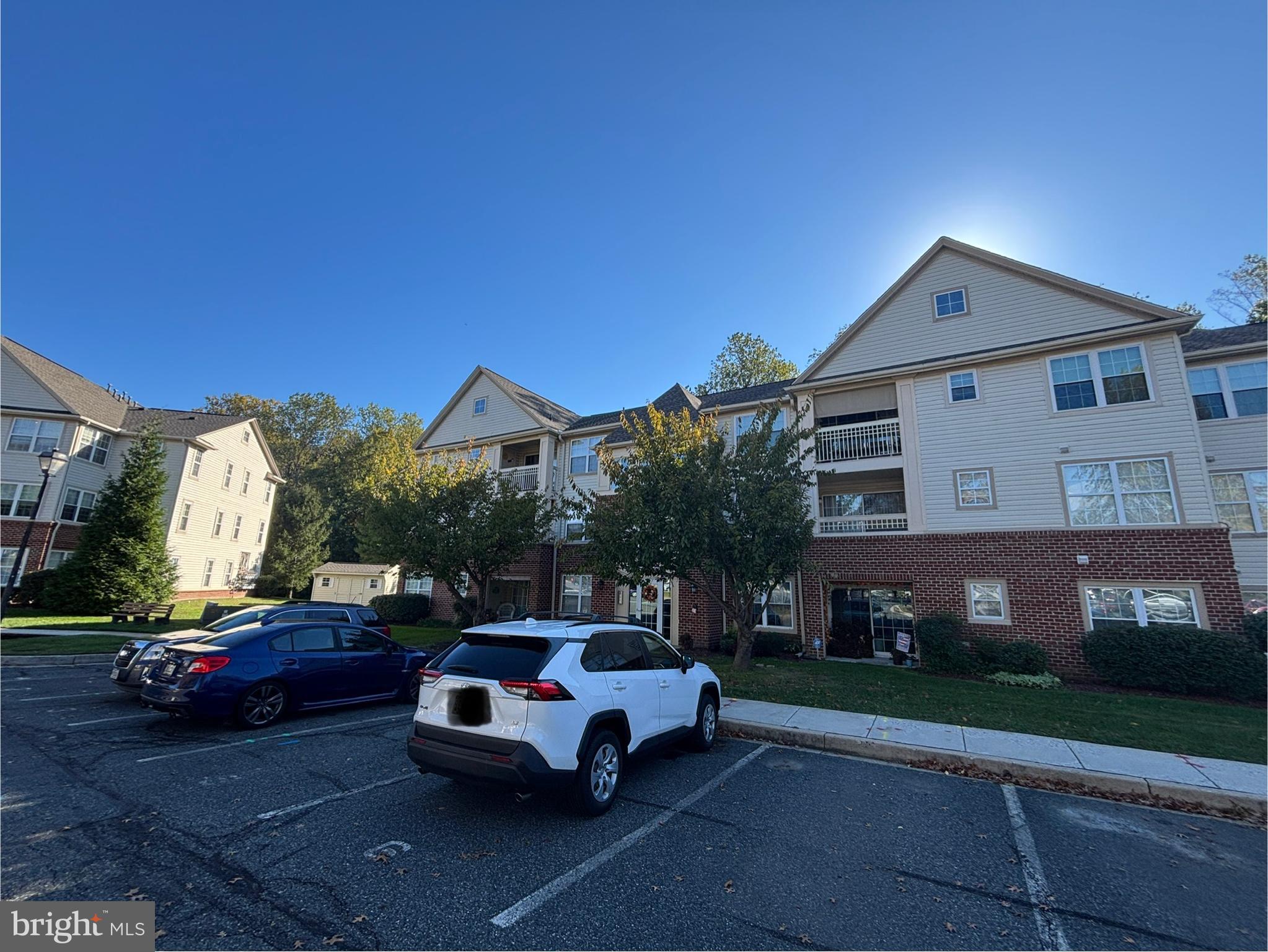 307 Tall Pines Court, Unit 3 Abingdon, MD 21009 - Photo 52 of 52 a car parked in front of a house