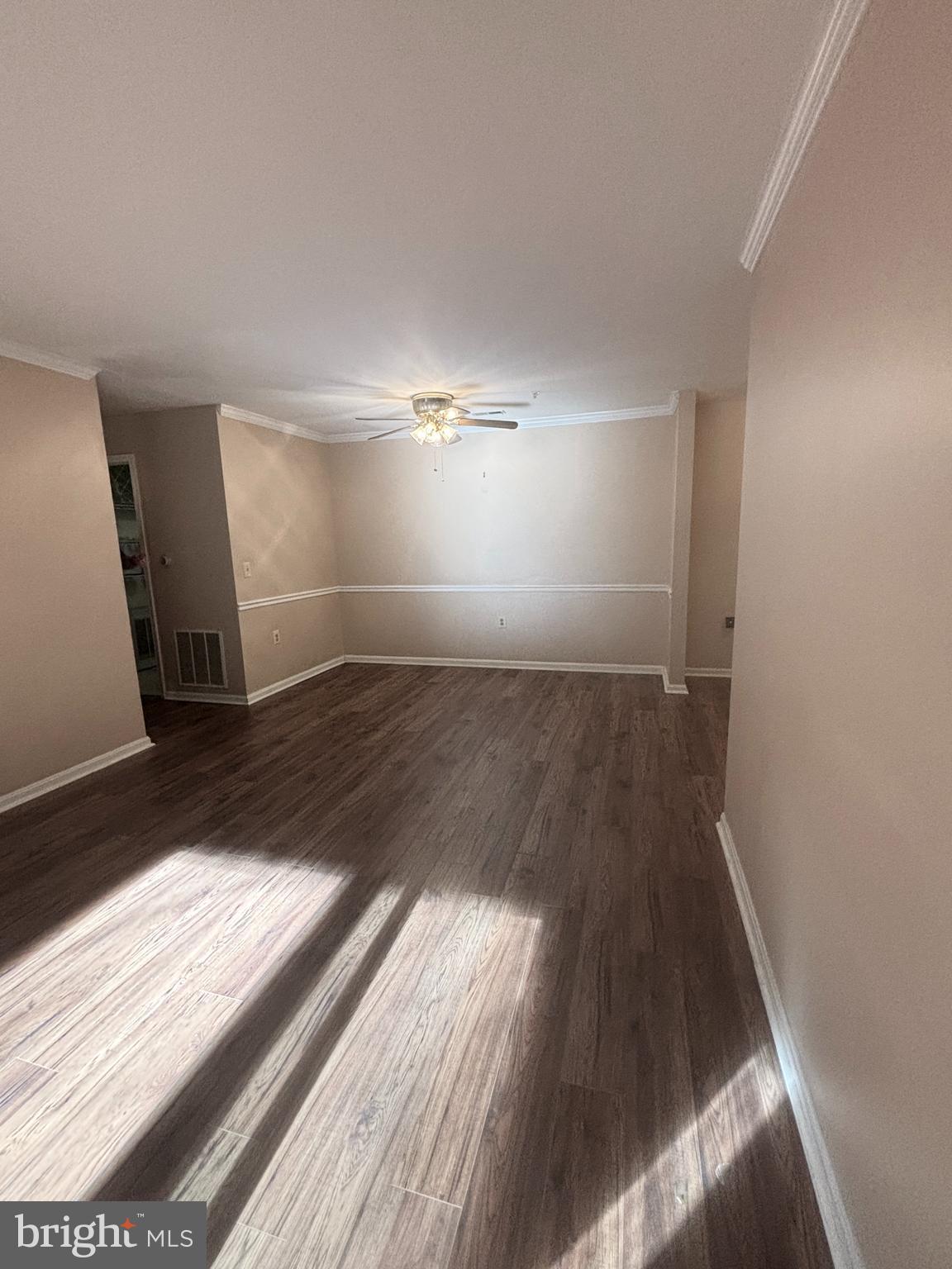 307 Tall Pines Court, Unit 3 Abingdon, MD 21009 - Photo 9 of 52 wooden floor in a hall with an empty room