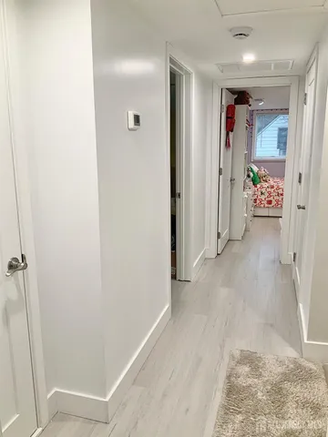 a view of a backyard with swimming pool