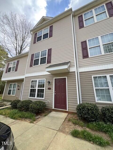 53 Red Lane Raleigh, NC 27606 - Photo 13 of 13 a front view of a house with a yard