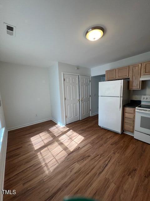 53 Red Lane Raleigh, NC 27606 - Photo 4 of 13 a view of empty room with wooden floor and window