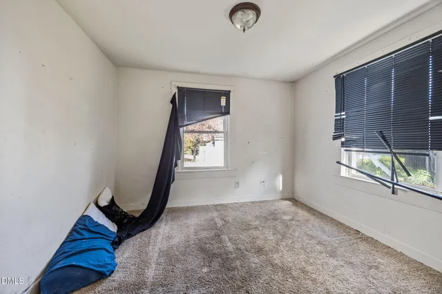 a view of a room with a staircase