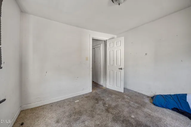 a view of hallway with closet
