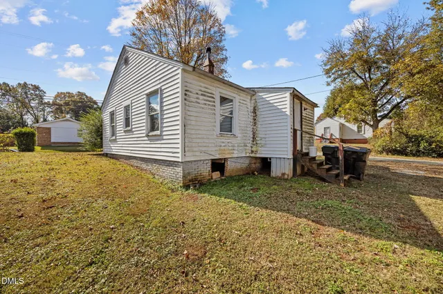a view of backyard of a house