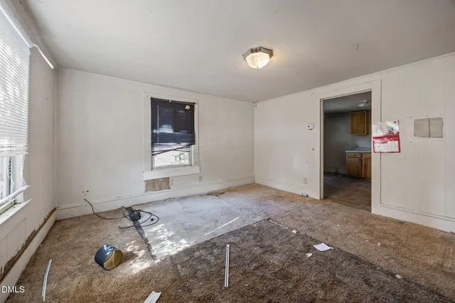 a view of a livingroom with furniture and window