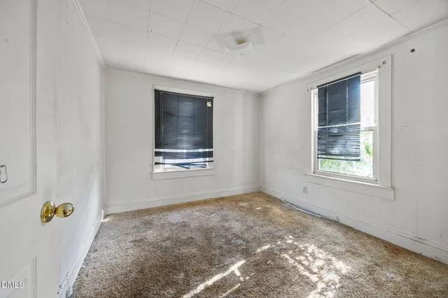 a view of an empty room with window