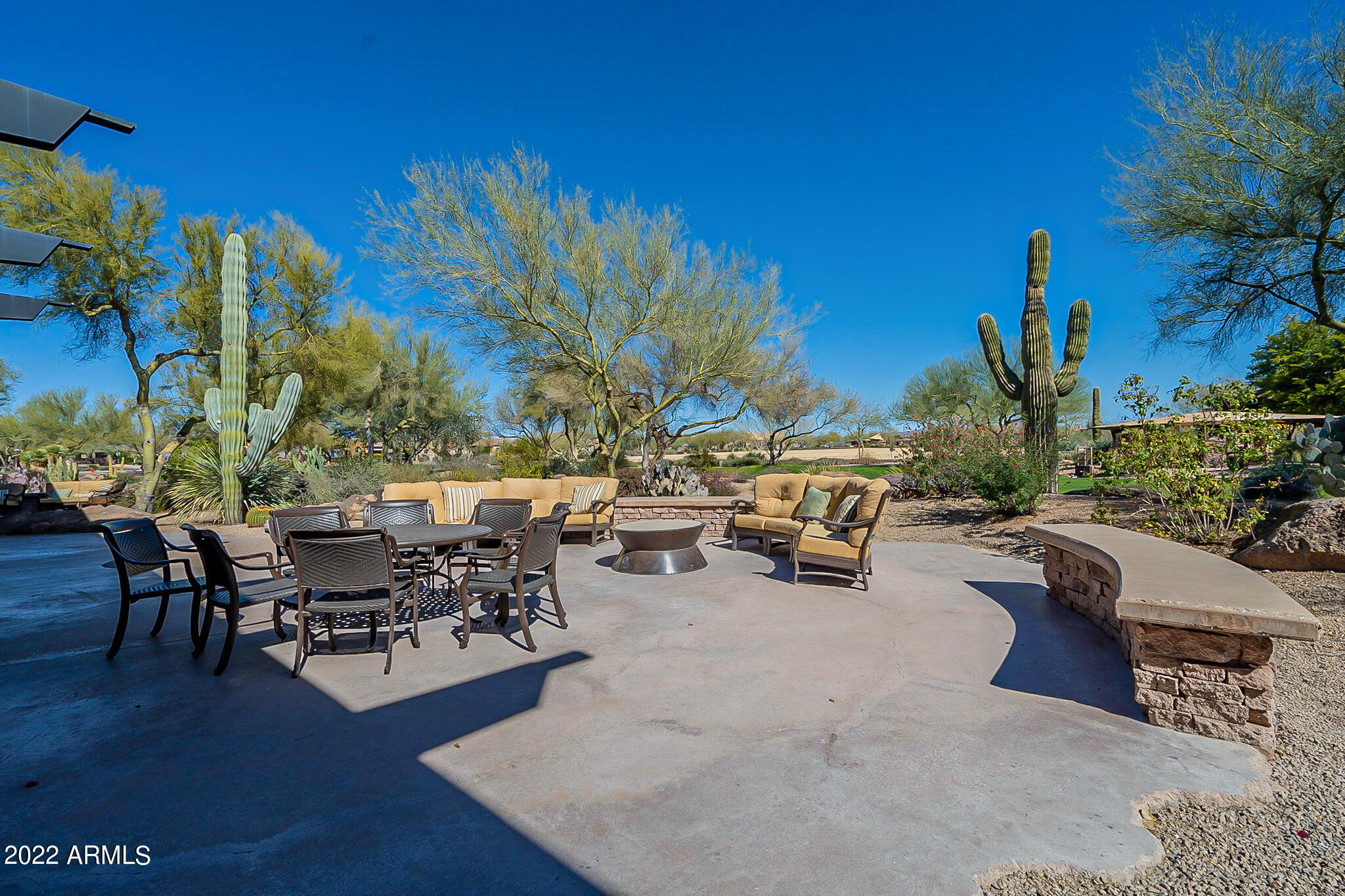 3935 East Rough Rider Road, Unit 1154 Phoenix, AZ 85050 - Photo 37 of 40 Clubhouse Outdoor Space