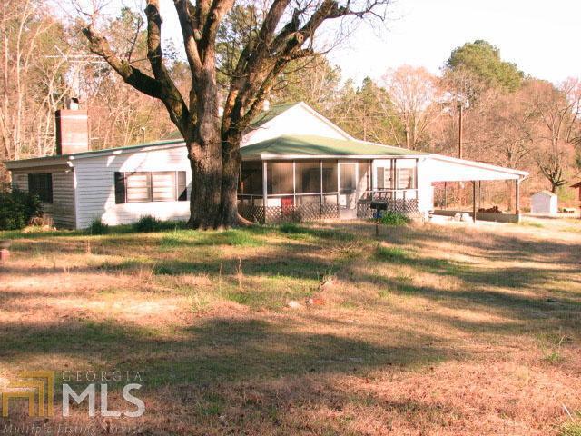 1294 Jones Ferry Road Elberton, GA 30635 - Photo 1 of 1 a front view of a house with a yard