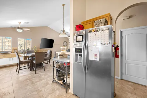 a view of a livingroom with furniture and a flat screen tv