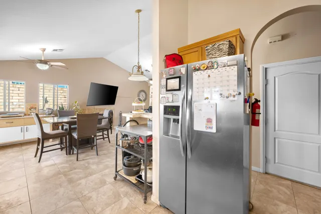 a view of a livingroom with furniture and a flat screen tv