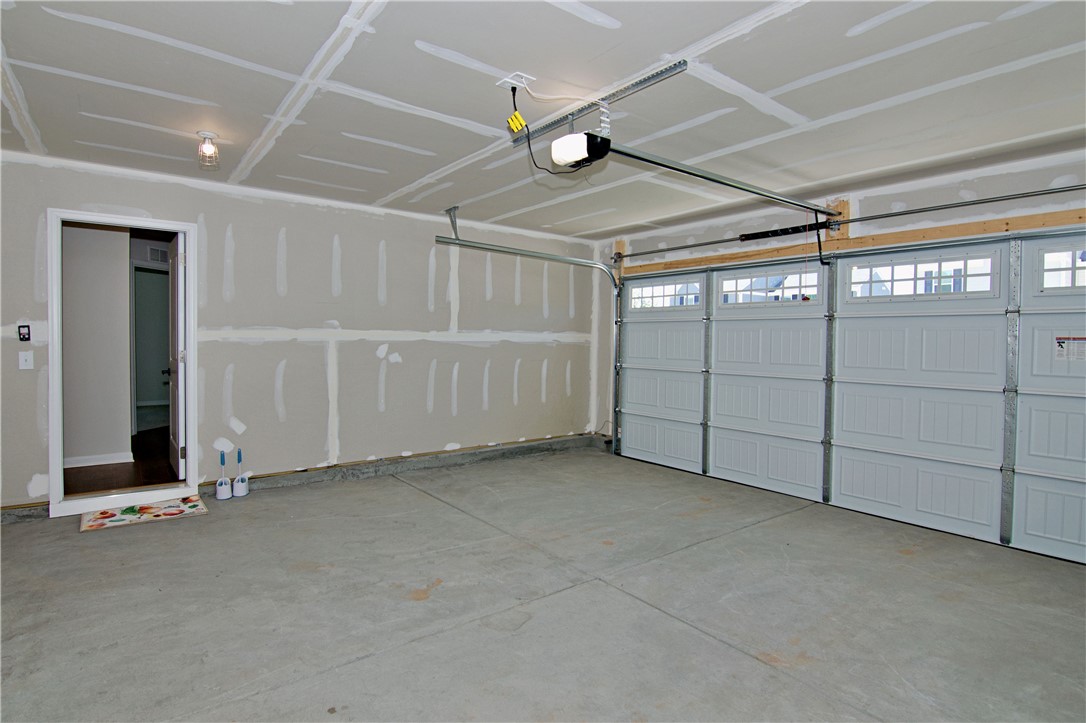 723 Peridot Way Westminster, SC 29693 - Photo 35 of 45 Secure parking and extra storage space within this practical garage.