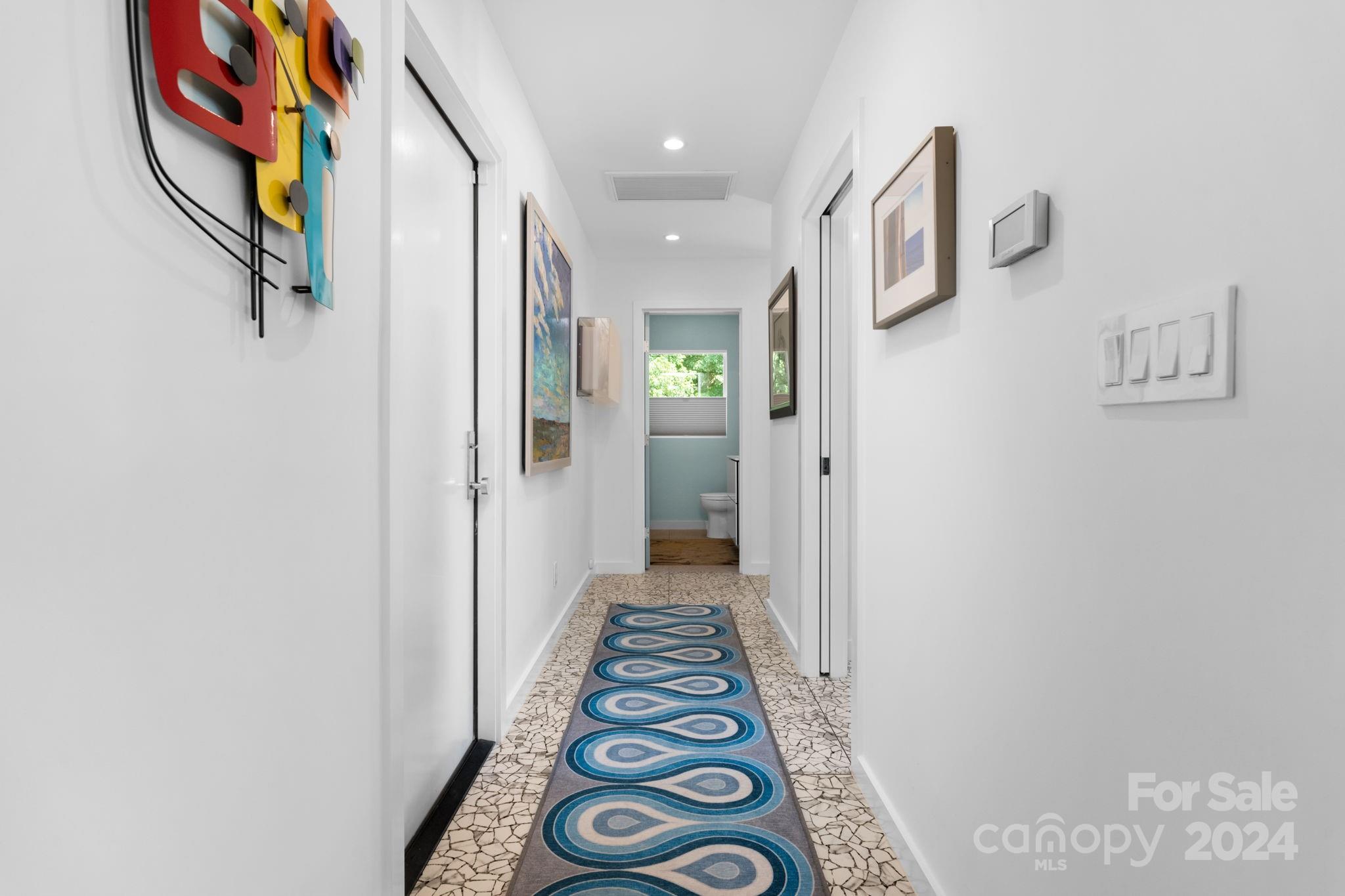 4142 Oldfield Road Charlotte, NC 28226 - Photo 21 of 48 a view of an entryway with wooden floor