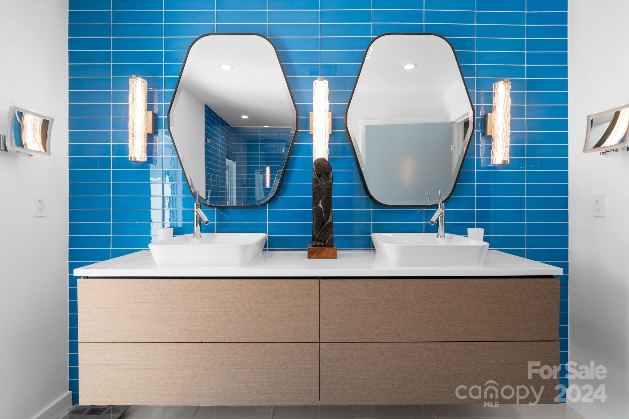 4142 Oldfield Road Charlotte, NC 28226 - Photo 30 of 48 a bathroom with a sink and a mirror