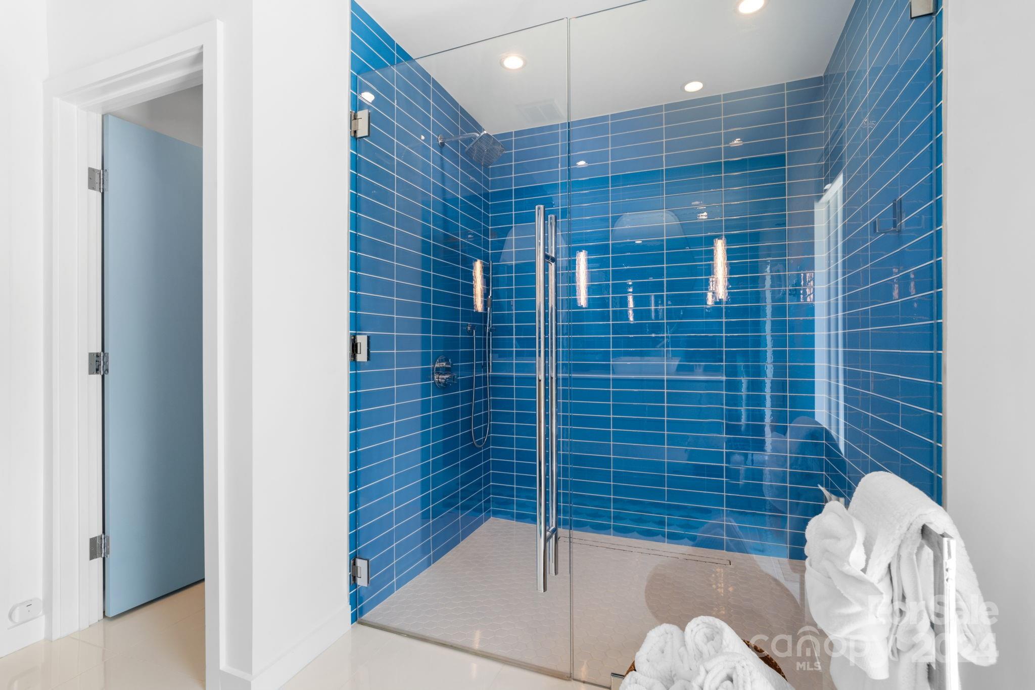 4142 Oldfield Road Charlotte, NC 28226 - Photo 31 of 48 a bathroom with a shower and a toilet
