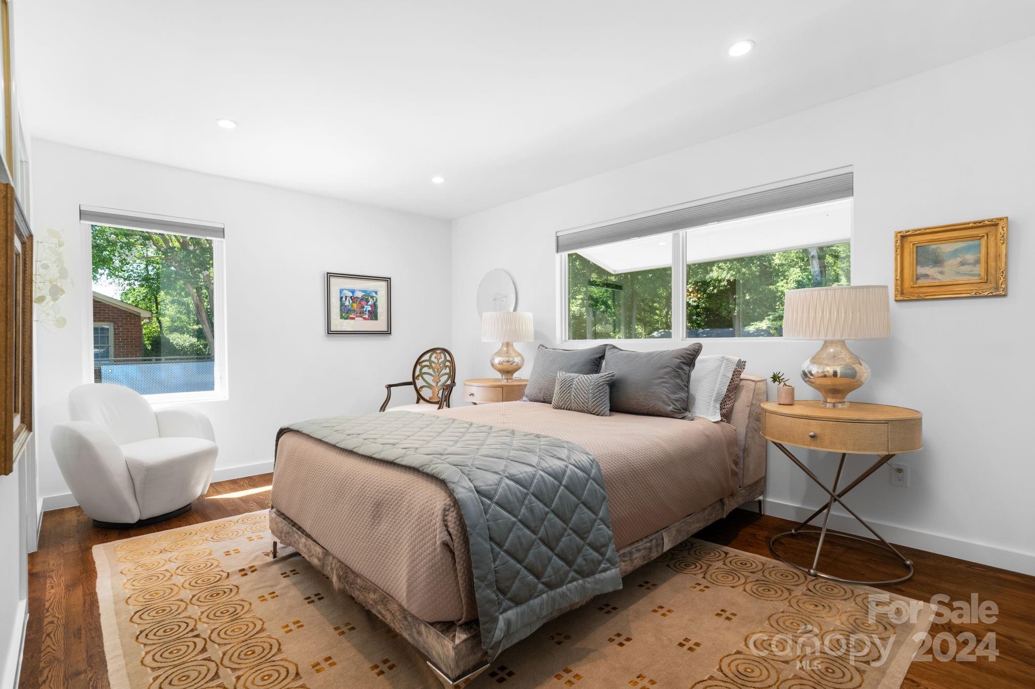 4142 Oldfield Road Charlotte, NC 28226 - Photo 33 of 48 a bedroom with a bed and a couch