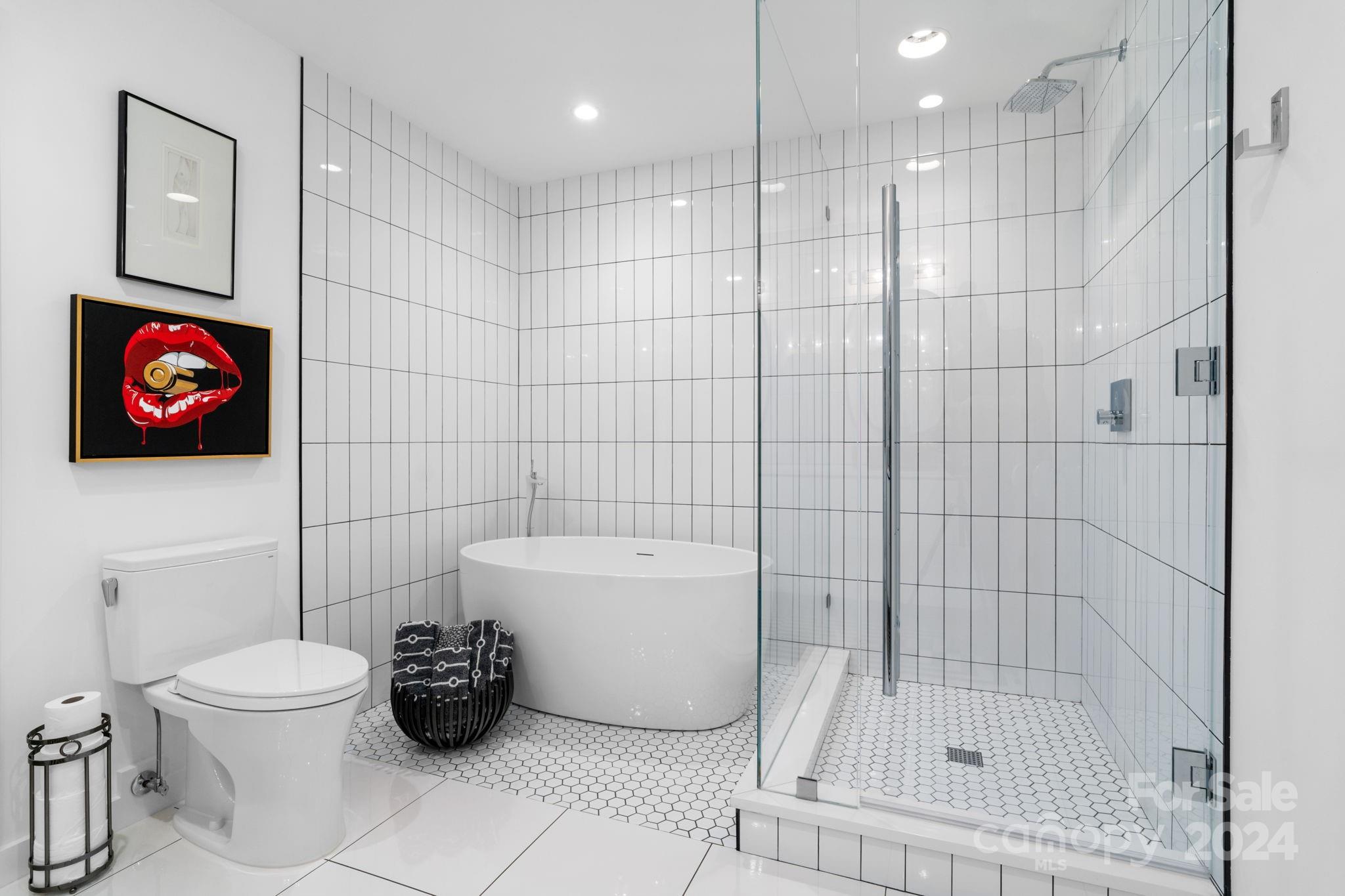 4142 Oldfield Road Charlotte, NC 28226 - Photo 36 of 48 a bathroom with a toilet and shower