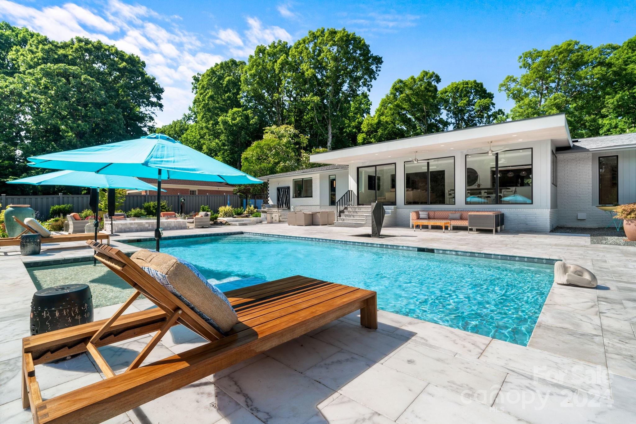4142 Oldfield Road Charlotte, NC 28226 - Photo 40 of 48 a view of a yard with furniture and a fire pit