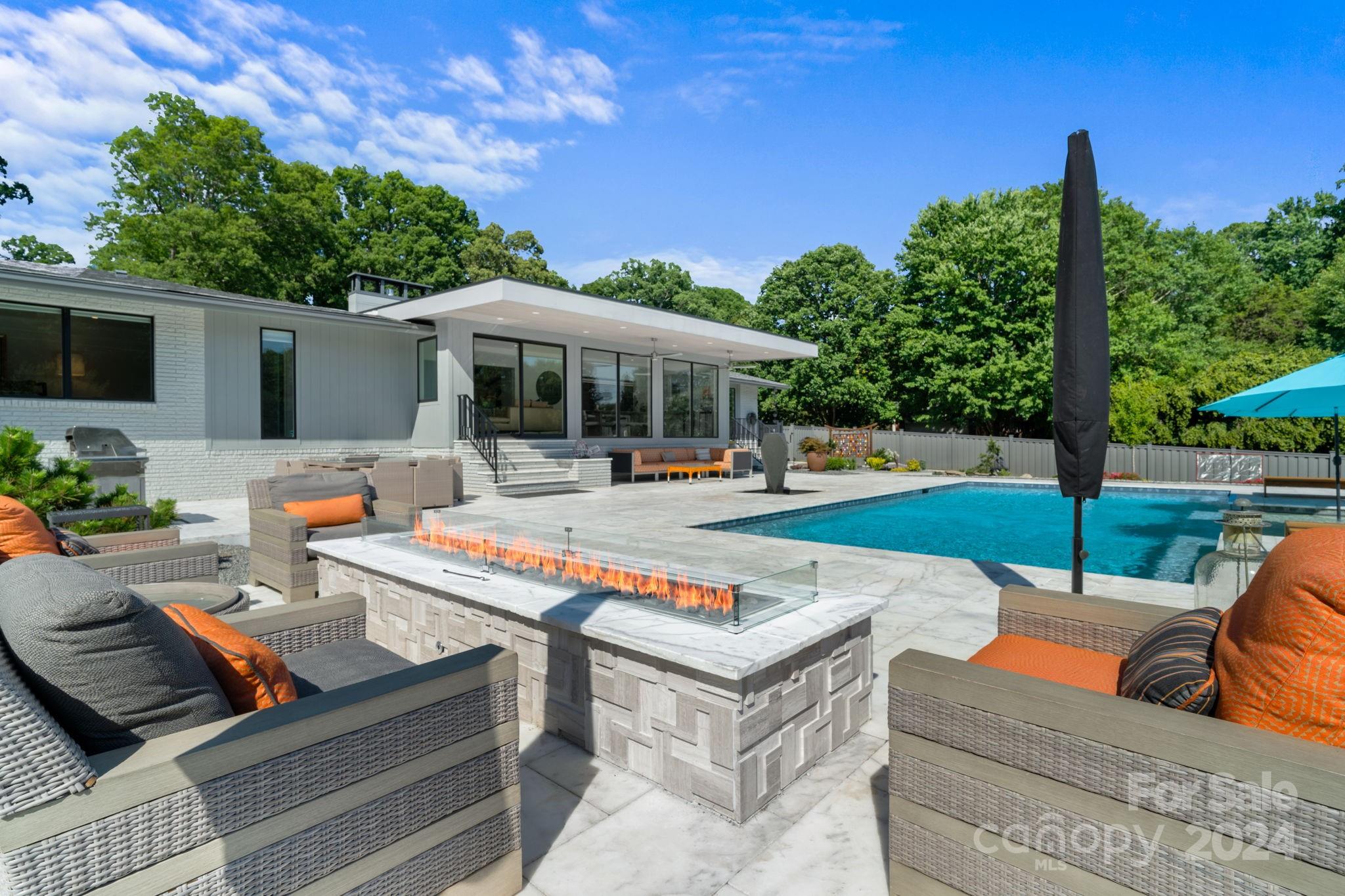 4142 Oldfield Road Charlotte, NC 28226 - Photo 44 of 48 a outdoor space with patio lots of green space