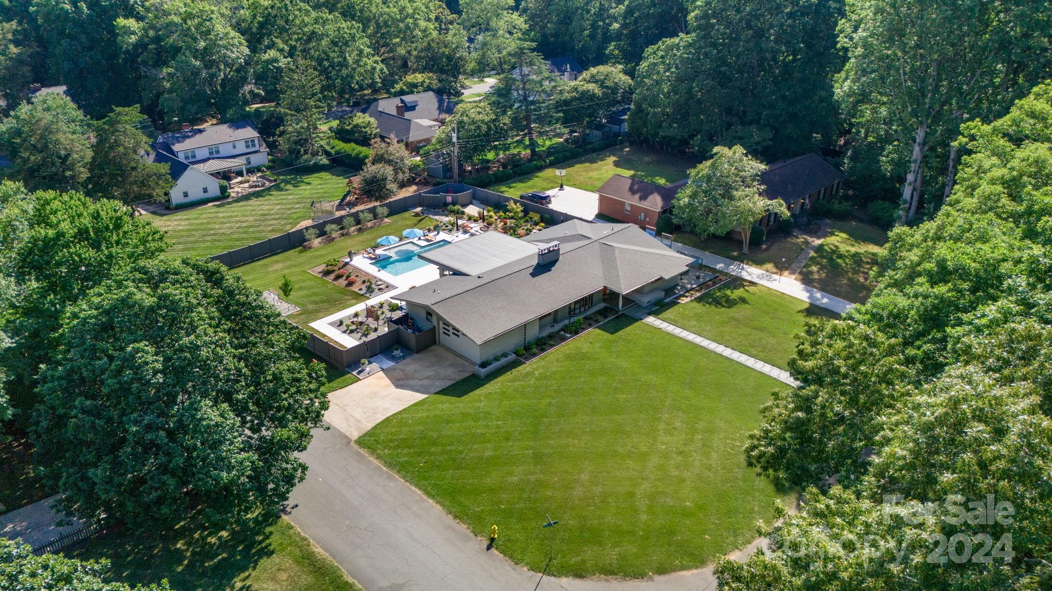 4142 Oldfield Road Charlotte, NC 28226 - Photo 47 of 48 an aerial view of a house having yard