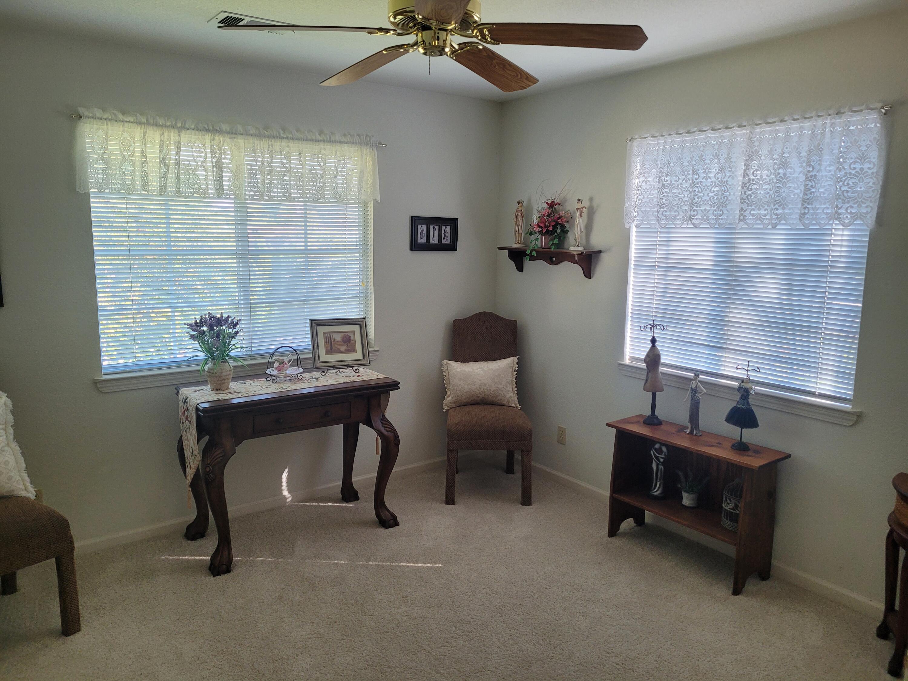 4979 Tralee Lane Redding, CA 96001 - Photo 13 of 19 a work room with furniture and a window