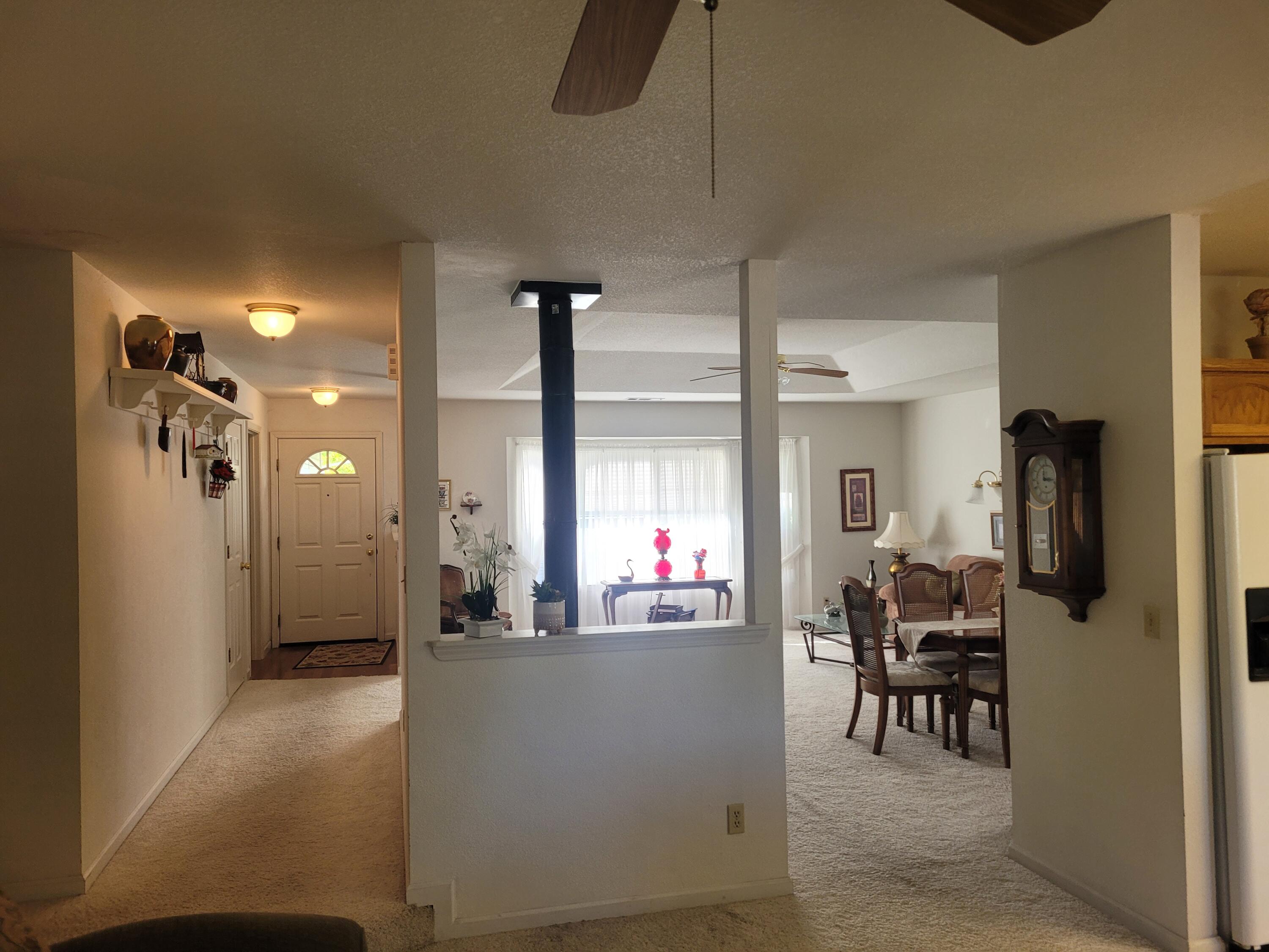 4979 Tralee Lane Redding, CA 96001 - Photo 6 of 19 a view of a living room and dining room