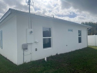 1625 2nd Avenue Southwest Vero Beach, FL 32962 - Photo 12 of 17 a bathroom with a sink and cabinets
