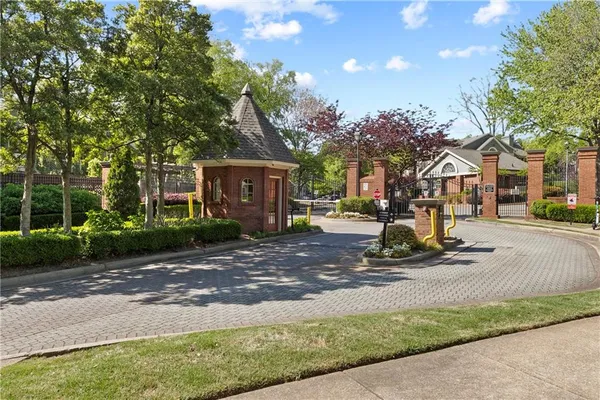 a view of a house with backyard porch and sitting area