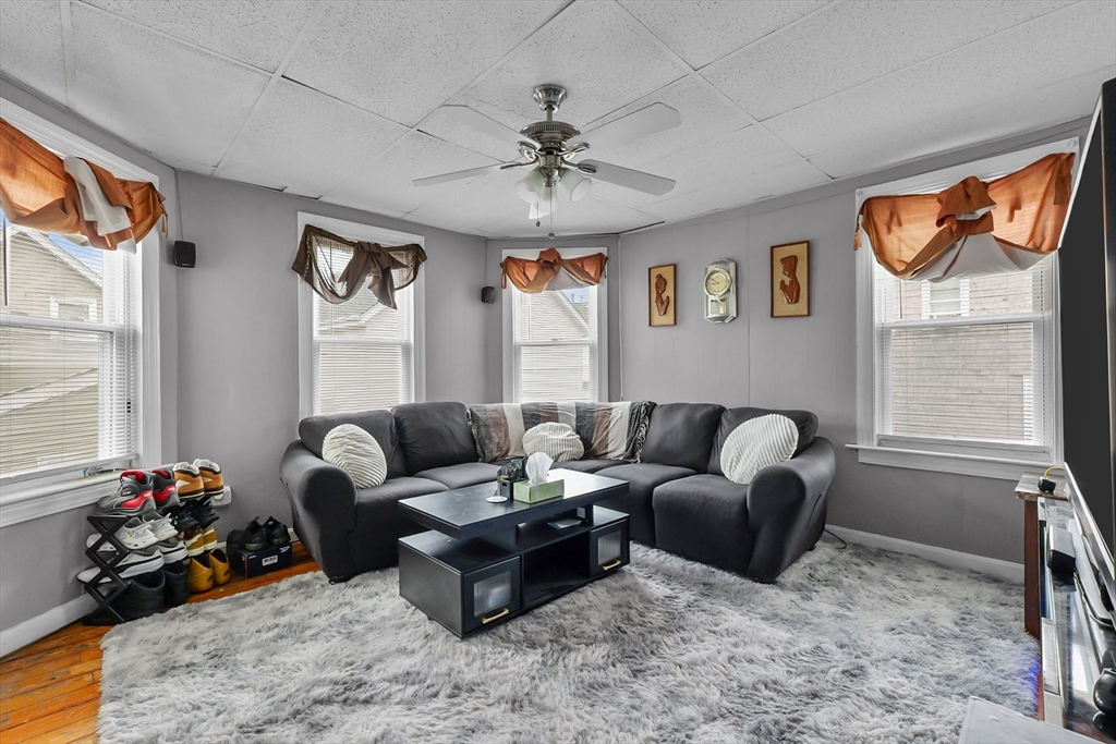146 Hunter Street Fall River, MA 02721 - Photo 14 of 41 a living room with furniture a window and a flat screen tv