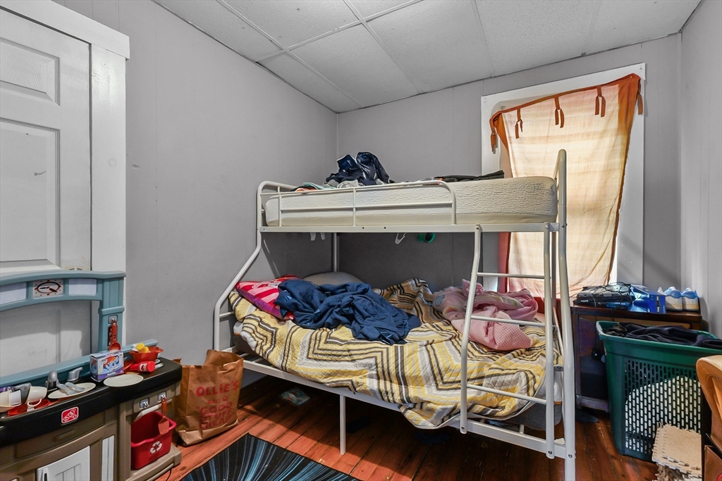 146 Hunter Street Fall River, MA 02721 - Photo 16 of 41 a bedroom with a bed and a window