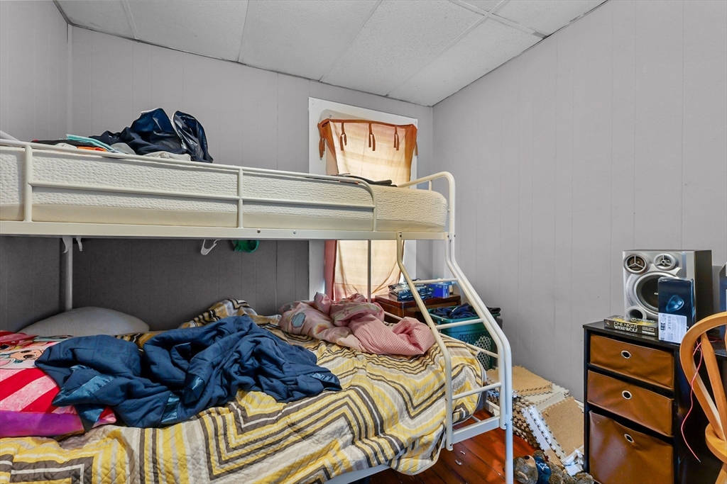 146 Hunter Street Fall River, MA 02721 - Photo 17 of 41 a bed room with a bed and a window