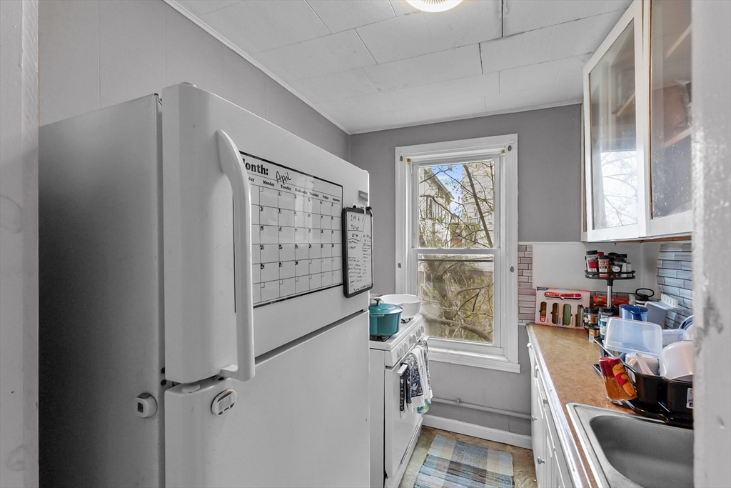 146 Hunter Street Fall River, MA 02721 - Photo 22 of 41 a room with storage and utility
