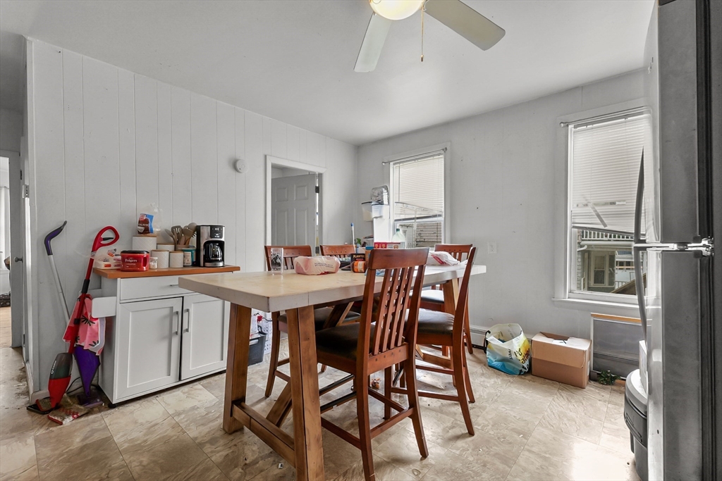 146 Hunter Street Fall River, MA 02721 - Photo 30 of 41 a kitchen that has a table and chairs in it