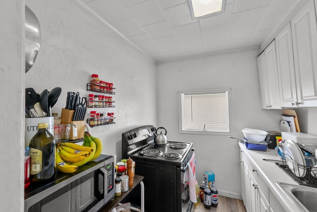 146 Hunter Street Fall River, MA 02721 - Photo 32 of 41 a room with storage and utility