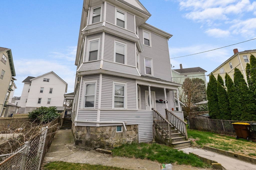 146 Hunter Street Fall River, MA 02721 - Photo 41 of 41 a front view of a house with a yard