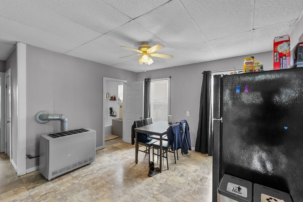 146 Hunter Street Fall River, MA 02721 - Photo 9 of 41 a workspace with furniture and chandelier