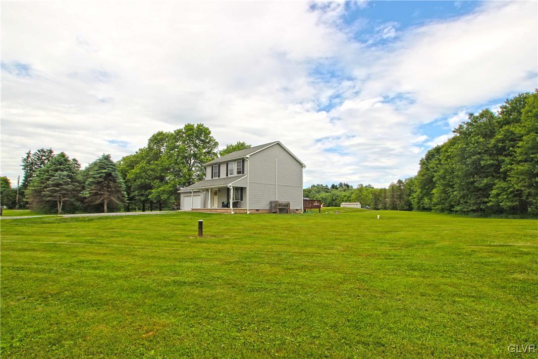 508 Weir Mountain Road Gilbert, PA 18331 - Photo 2 of 37 a house view with outdoor space and trees in the background