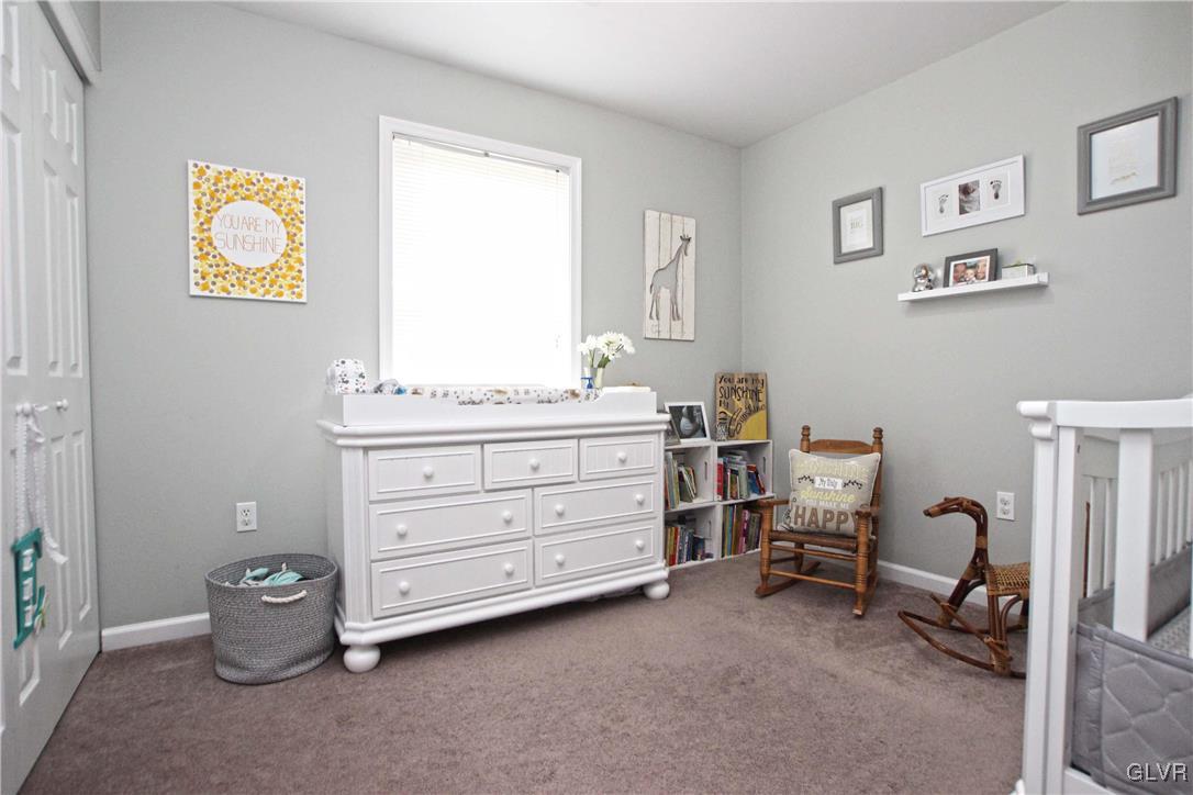 508 Weir Mountain Road Gilbert, PA 18331 - Photo 27 of 37 a room with furniture and a window