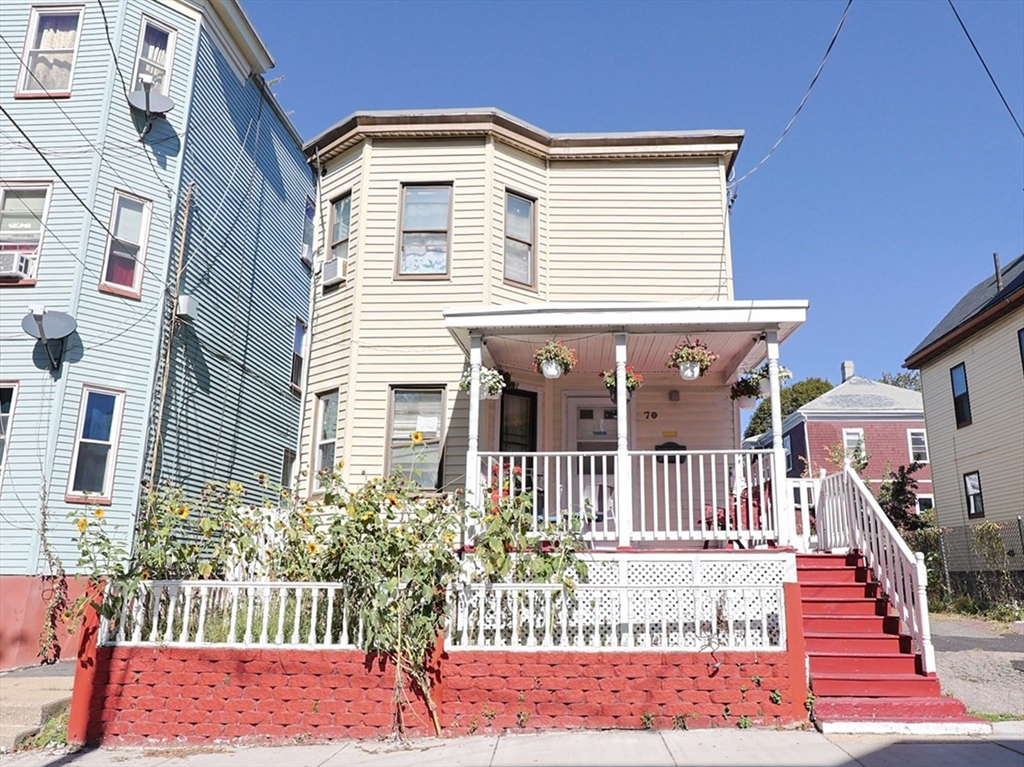 a front view of a house with a porch