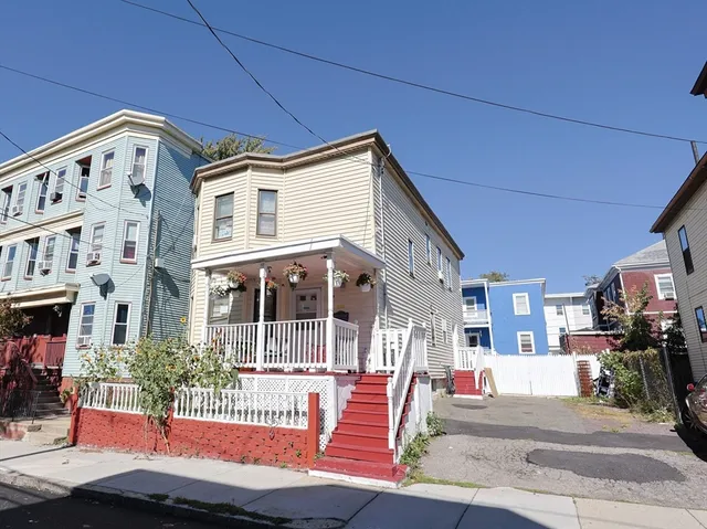 a front view of a building with street view