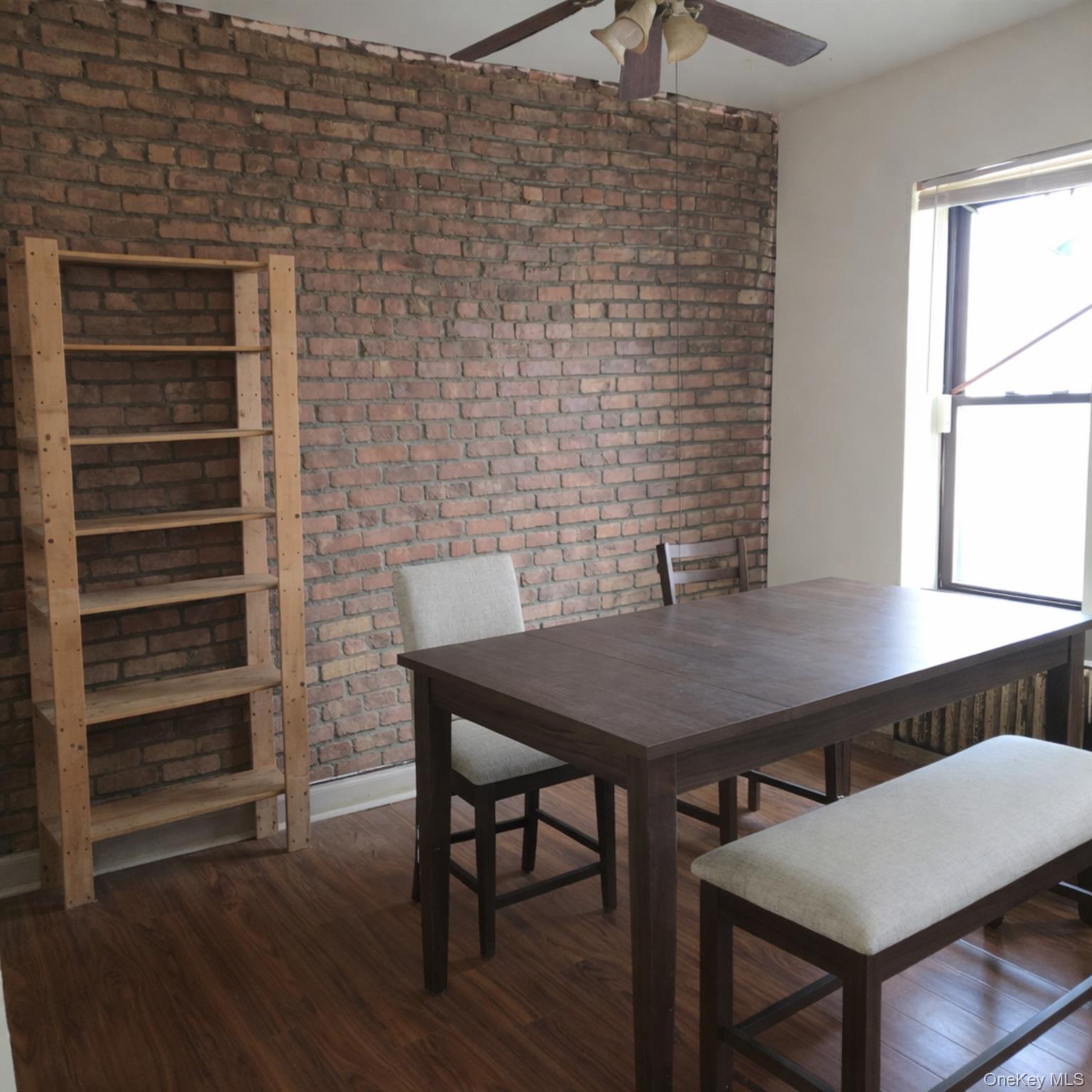 91-45 85th Street Queens, NY 11421 - Photo 7 of 15 a view of a workspace with furniture