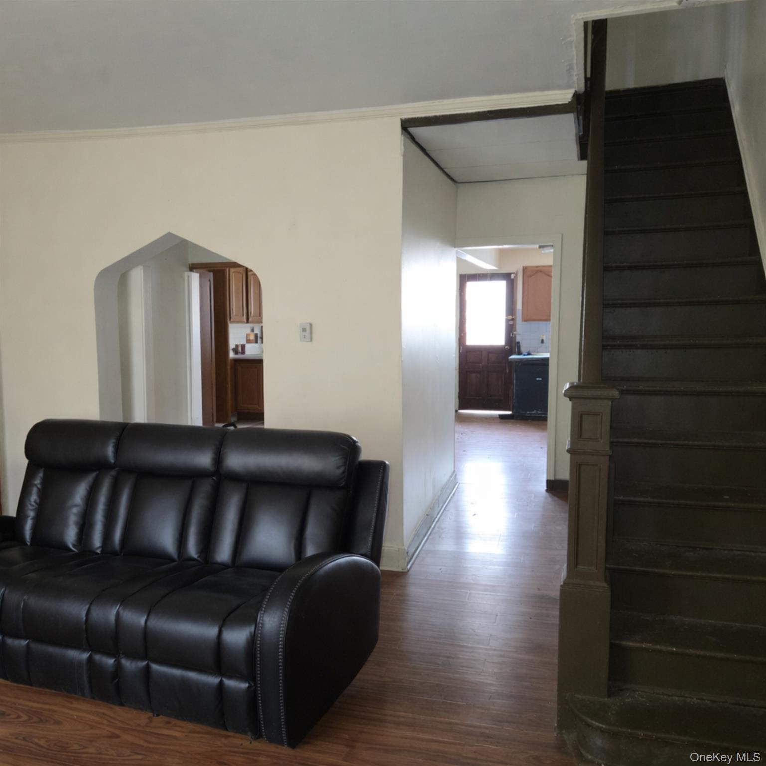 91-45 85th Street Queens, NY 11421 - Photo 9 of 15 a living room with furniture