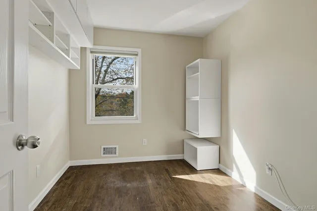 an empty room with window