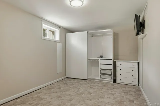 wooden floor and window in a room
