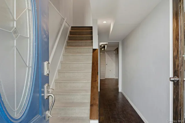 a view of hallway with stairs