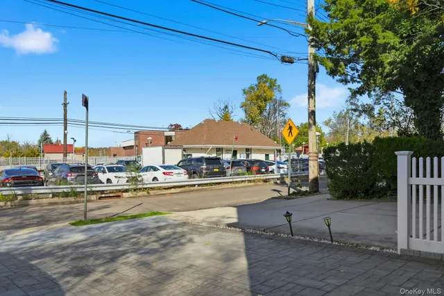 a picture of a bench in front of a wall
