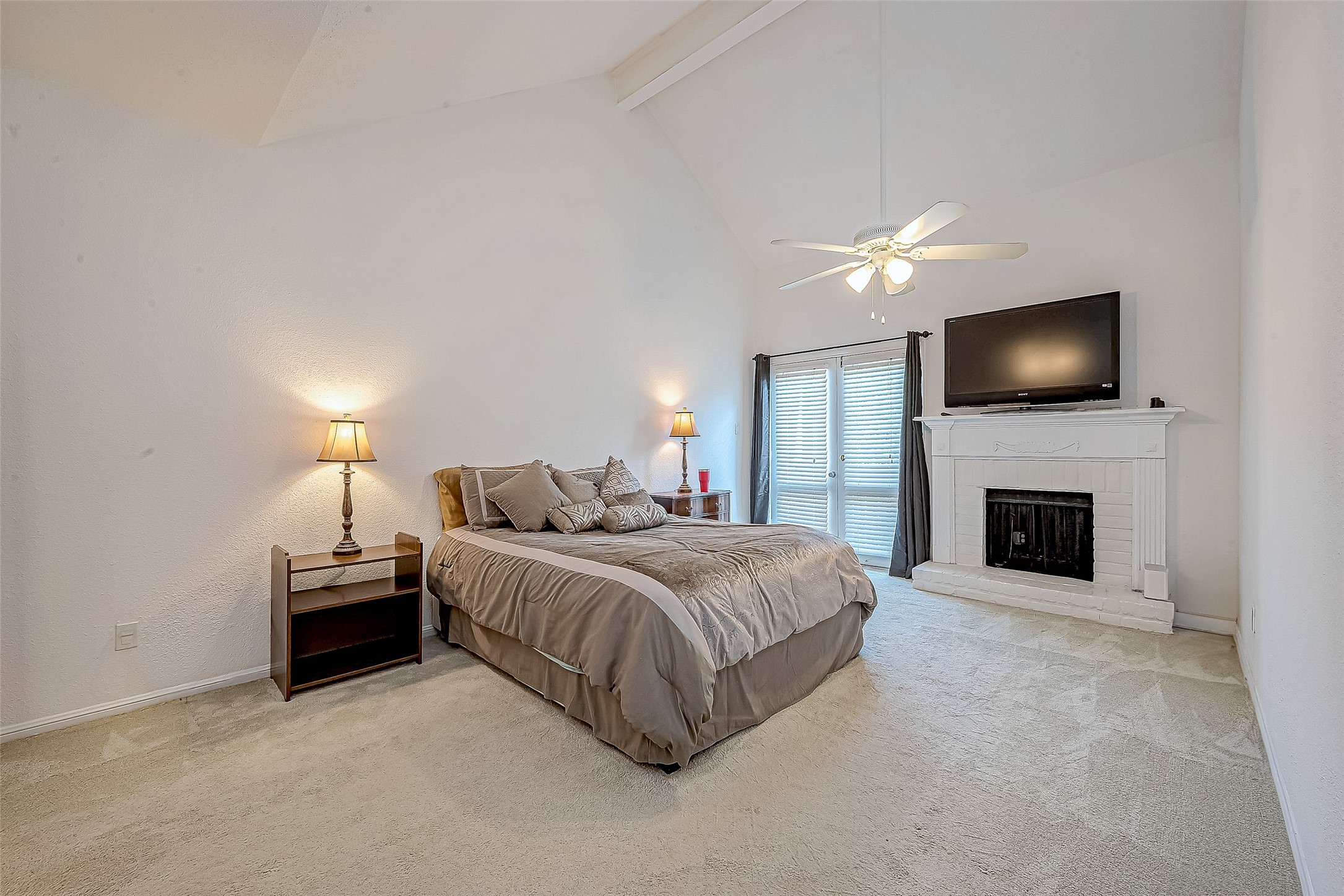 2100 Tanglewilde Street, Unit 189 Houston, TX 77063 - Photo 19 of 31 Upstairs Primary bedroom 18x12 with FP
(Currently used for Electric/Cables)