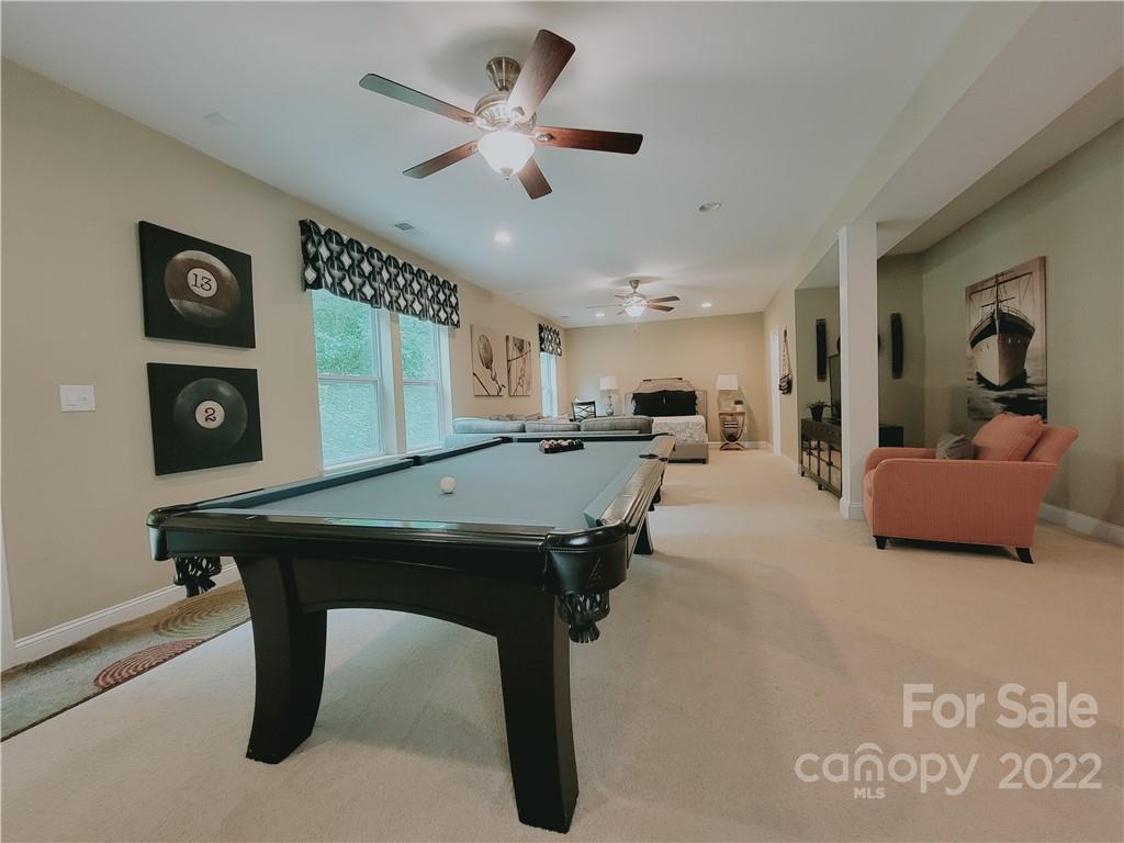 7716 West Berkeley Road Denver, NC 28037 - Photo 24 of 33 a living room with furniture
