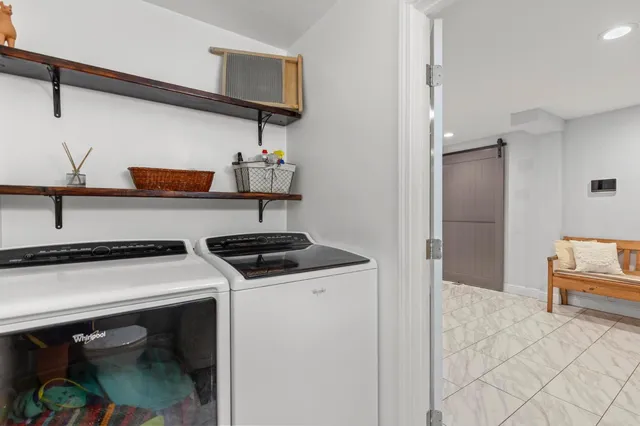wooden floor in an empty room and a window